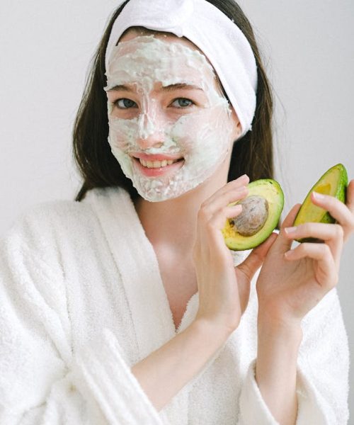 Beautiful girl with avocat mask